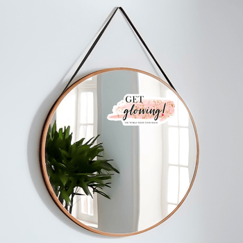 Get Glowing! The world Needs Your Magic decal on a mirror
